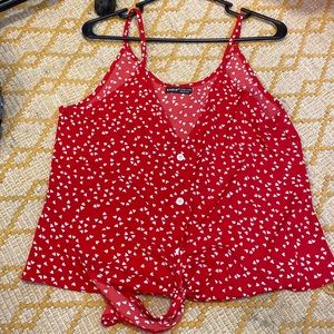 Spaghetti strap tank top. Red with white hearts. Great condition